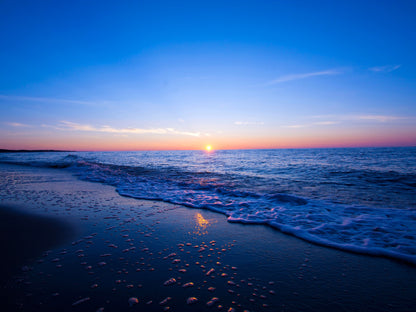 Ola chocando en la playa